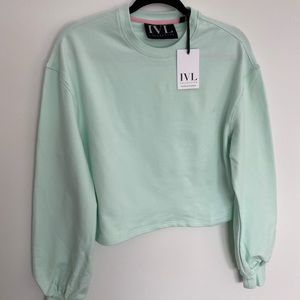 Bubble sleeve cropped sweatshirt. IVL collective. Blue glass - size 6